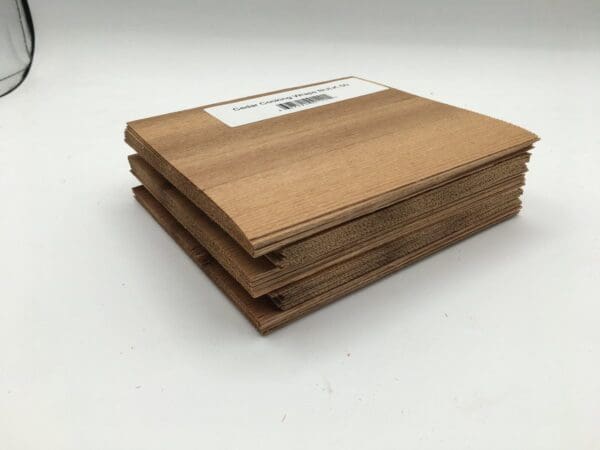 A stack of three wooden boards on top of each other.
