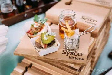 A tray of food on top of wooden boards.