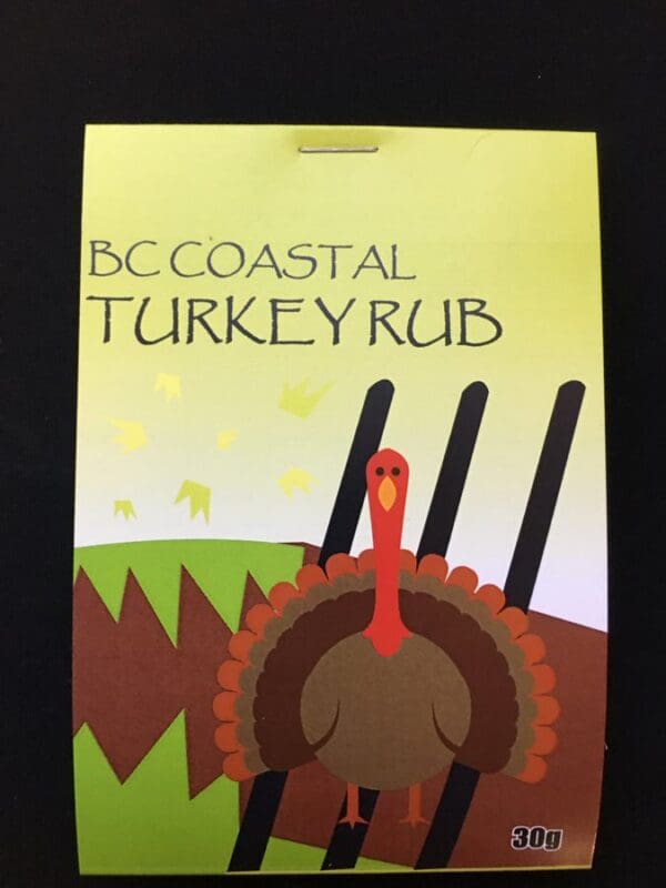A turkey rub is sitting on the cover of a book.